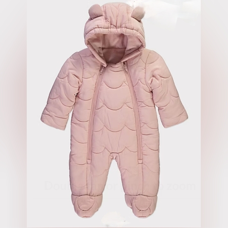 Космонавт/ ескимос в розово