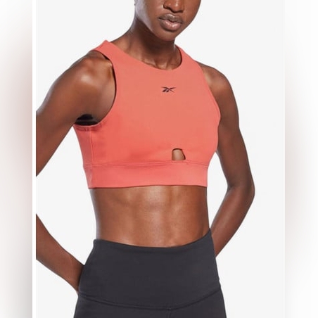 REEBOK Studio Beyond The Sweat Crop Top Orange