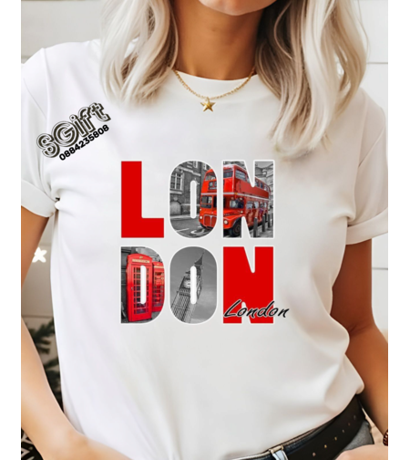 Бяла дамска тениска с голям графичен надпис LONDON, запълнен със снимки на червен двуетажен автобус, Биг Бен и телефонна кабина.