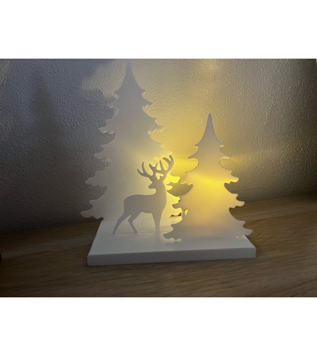 Светещ декор с елен в гора