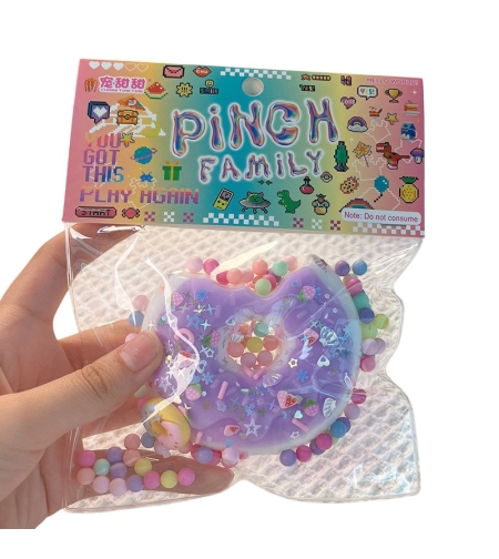 Jucarie Antistres Squishy, Flippy, cu Revenire Lenta, Squeeze Pinch Family, Model Gogoasa, 6x6 cm, 99g, Ambalaj Transparent, Mov