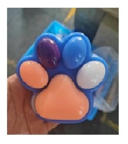 Jucarie Antistres Squishy, Flippy, cu Revenire Lenta, Labuta de Pisica Pufoasa, 8.5 x 7.5 cm, Ambalaj Transparent, Albastru Portocaliu