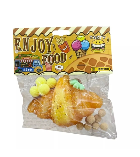 Jucarie Antistres Squishy, Flippy, cu Revenire Lenta, Squeeze Pinch Family, Model Croissant, 10x8 cm, 90g, Ambalaj Transparent, Maro