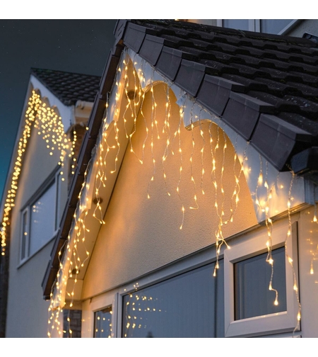 Instalatie Craciun Yoto, Tip Franjuri/Turturi, 7 m, 200 LED-uri, Prelungitor 1.5 m, 8 Jocuri de Lumini, Interconectabila, Conectare la Retea, Fir transparent, Interior/Exterior, Alb Cald
