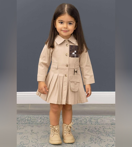 Бежова детска рокля с плисета