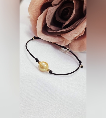 Гривна на конец с естествена, кафява перла и 18К елементи Gumon