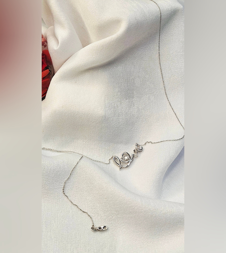 Златно колие от 14К бяло злато и диамант Love