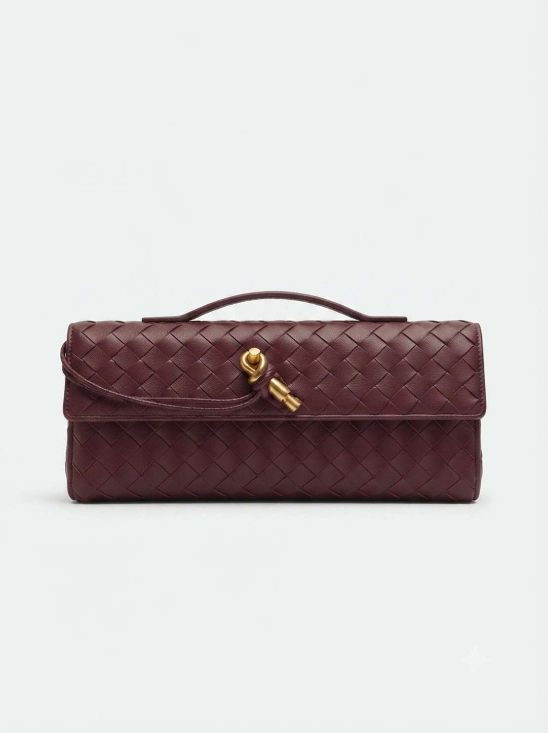 LEATHER CLUTCH IN BURGUNDY