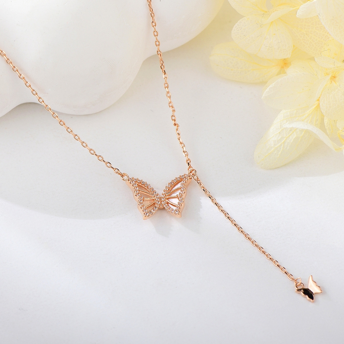 BUTTERFLY NECKLACE ROSE GOLD PLATING