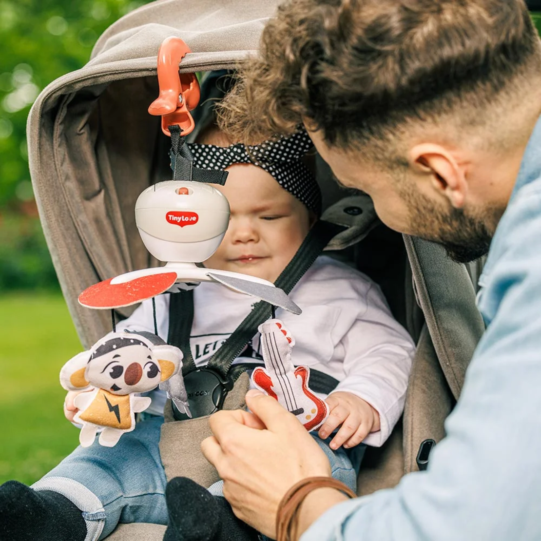 TINY LOVE Take-Along Mobile 3-в-1 Музикална въртележка от серията Tiny Rockers с 3 лесни начина за закачане у дома или в движение 30 минути музика с 5 рок-енд-рол мелодии 0м+