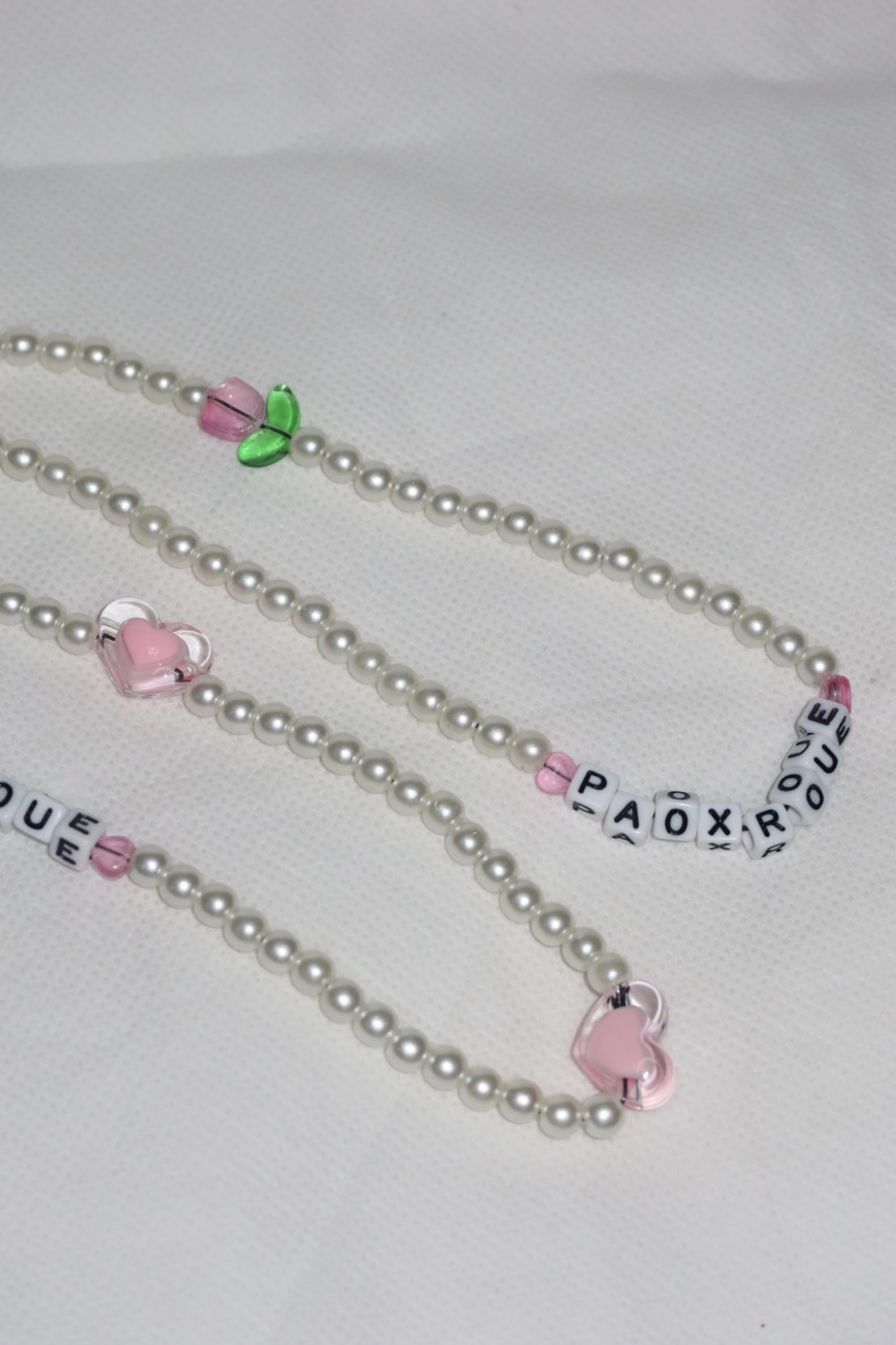 ROUÉxPÂO TULIPE toiletry bag charm