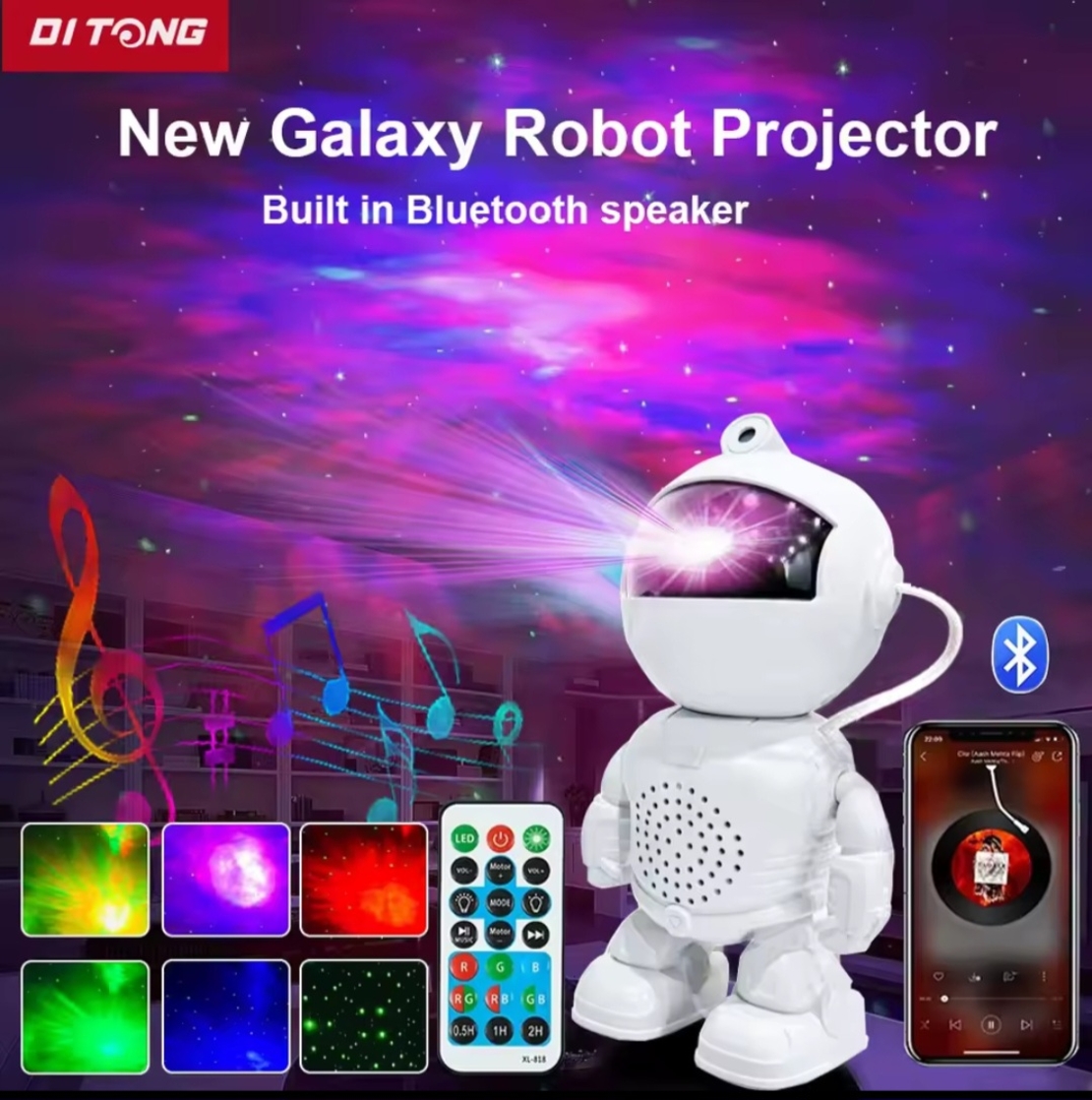 Robot Projector Light – мултифункционална детска нощна лампа, лазерен проектор на звездни галактики и Bluetooth тонколона, оформена като фигура на робот-астронавт.