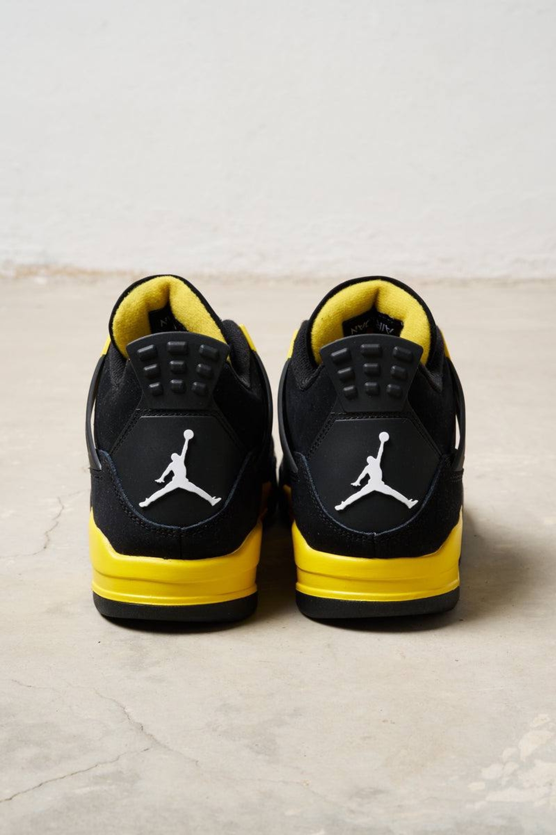 Air Jordan 4 Retro “Yellow Thunder”