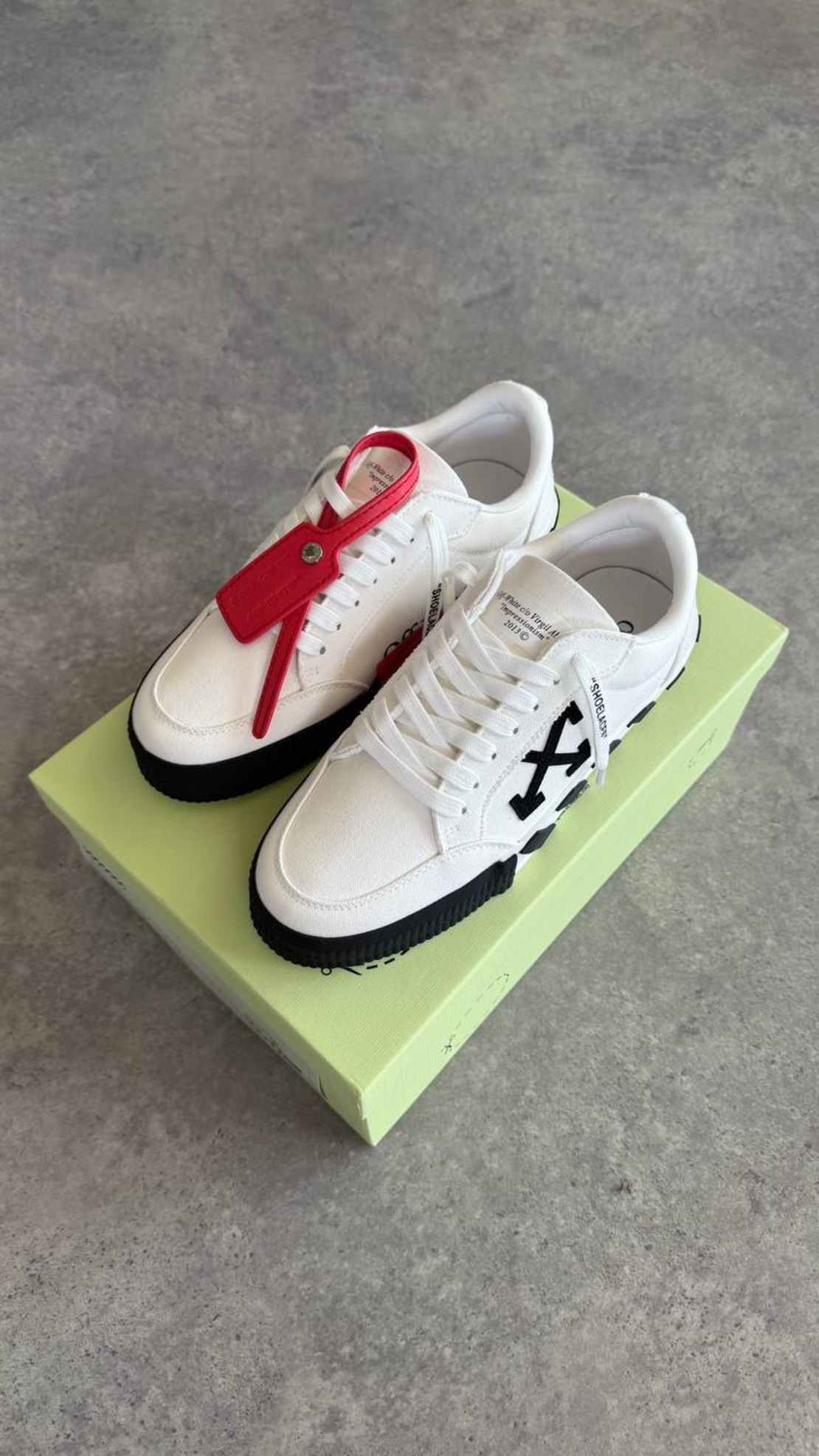 Off-White Canvas Low-Top “White”