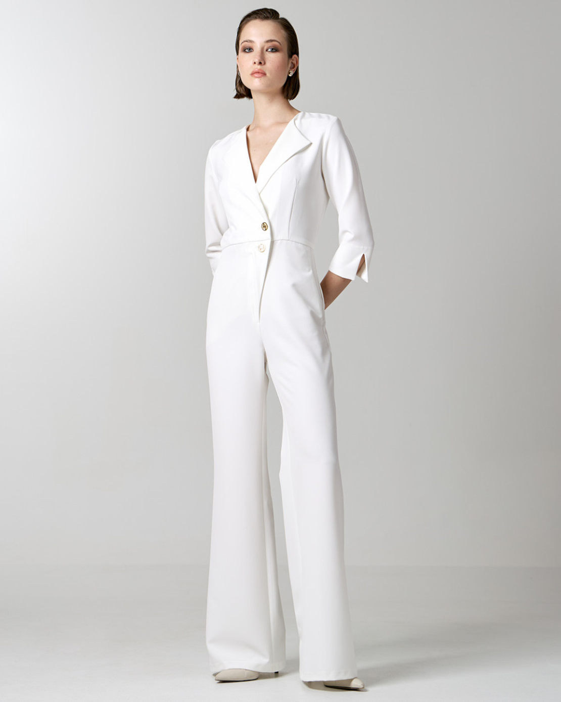 Jumpsuit with monogram buttons in white