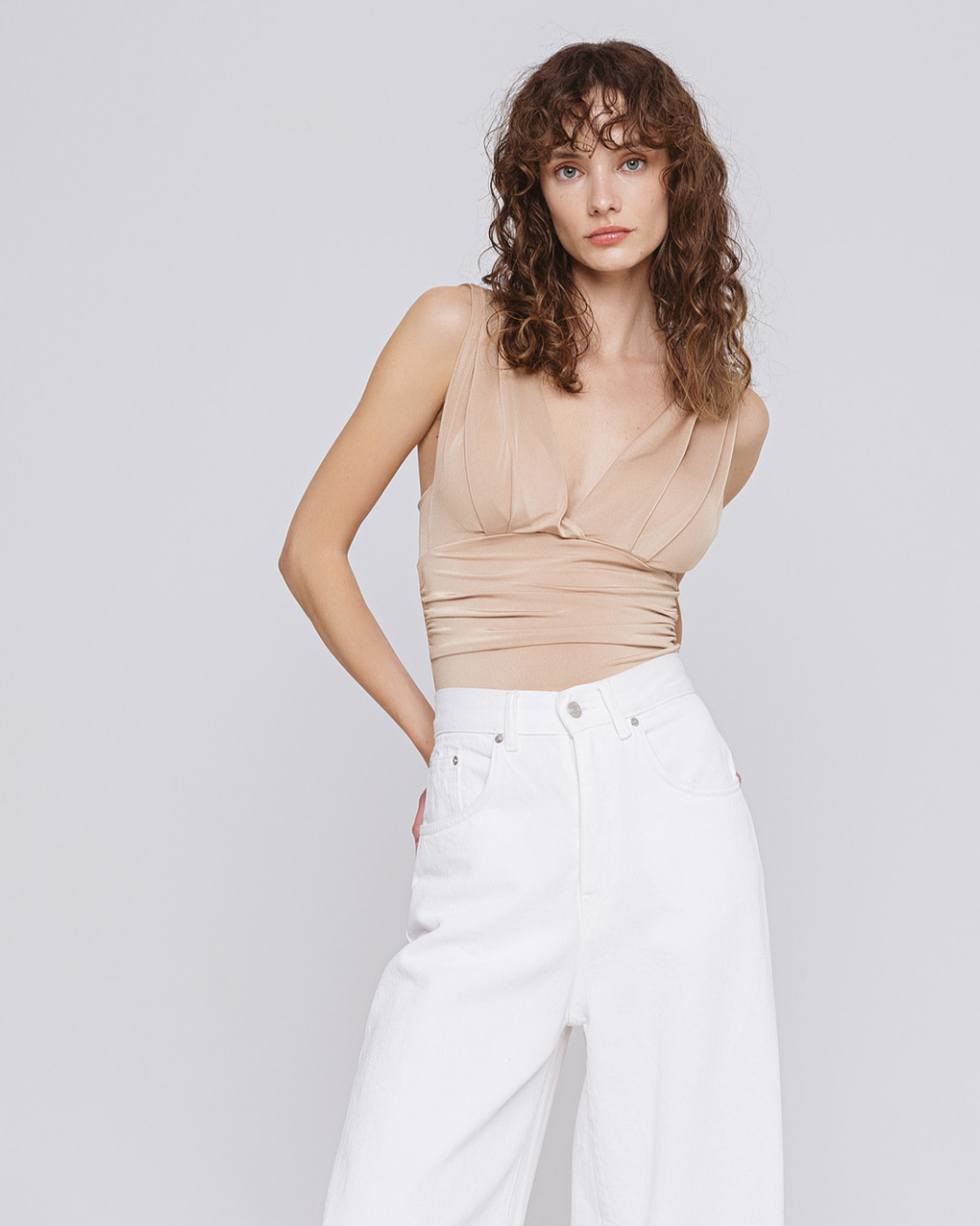 Bodysuit with a deep V-neckline