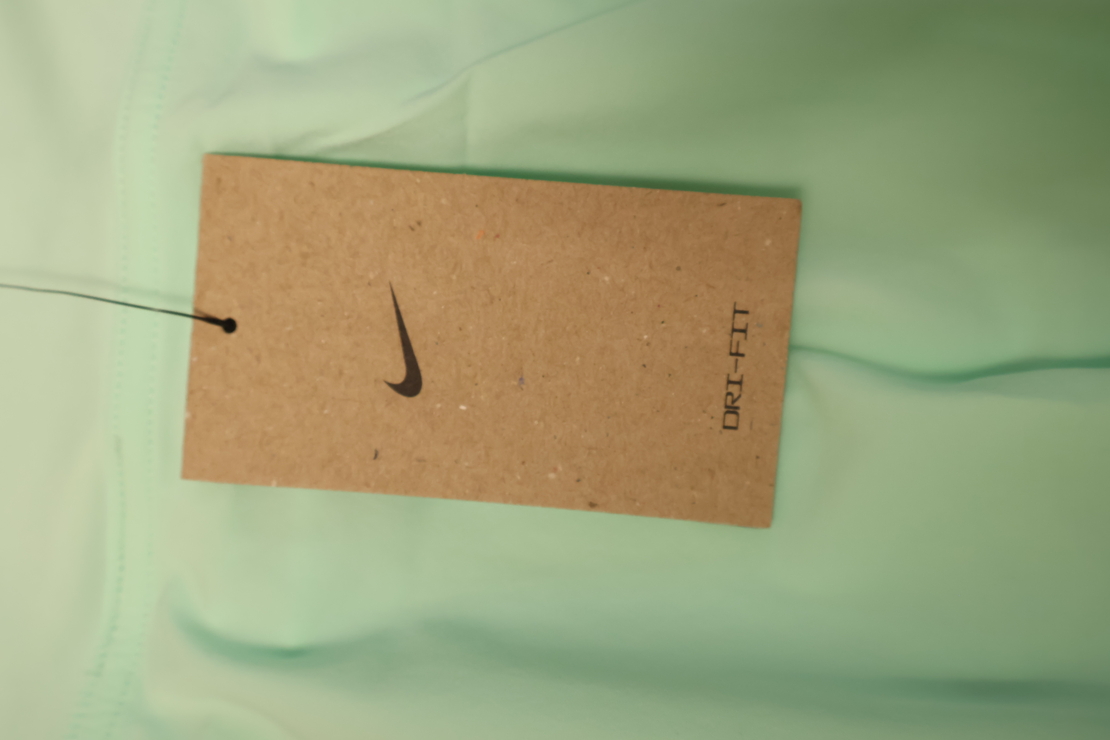 Nike Dri-FIT тенис пола с клин - XS