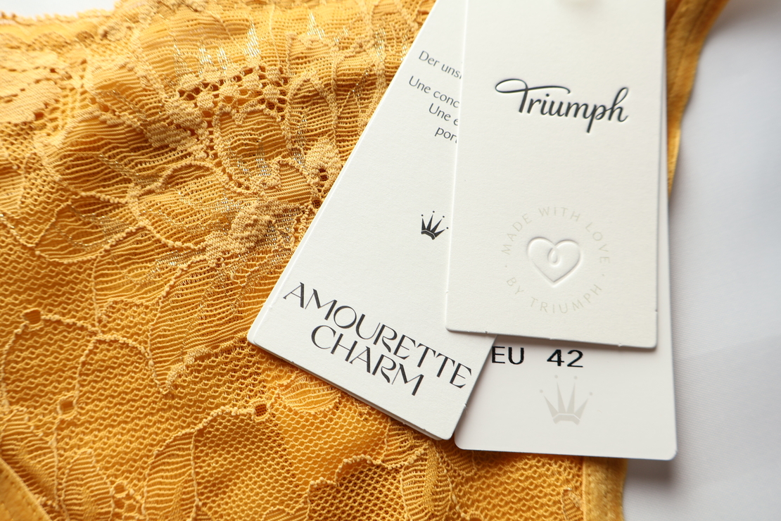 Triumph Amourette Charm Lace String • EU 42