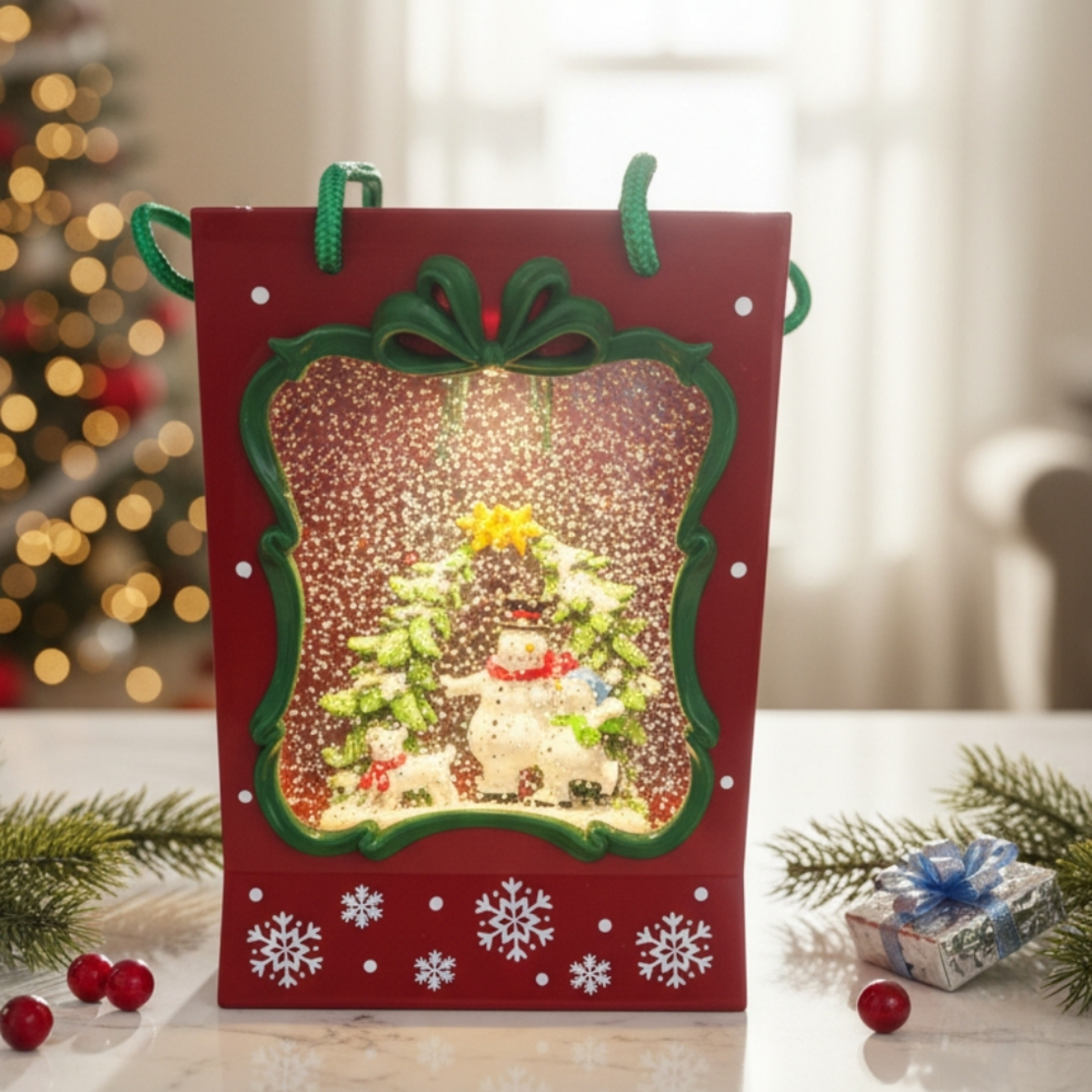 Празнична Коледна декорация във вид на подаръчна чанта със светлини и снежен ефект