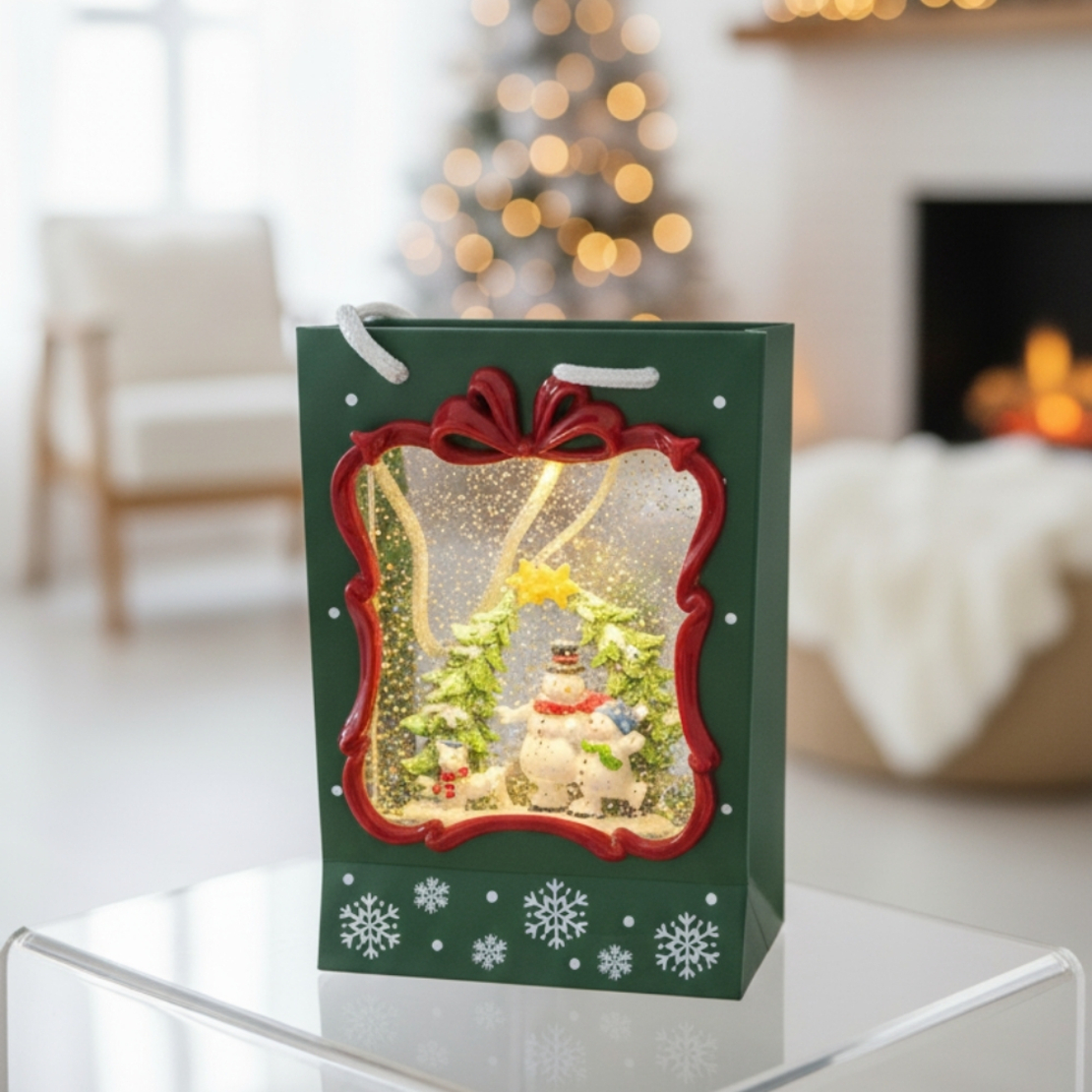 Празнична Коледна декорация във вид на подаръчна чанта със светлини и снежен ефект