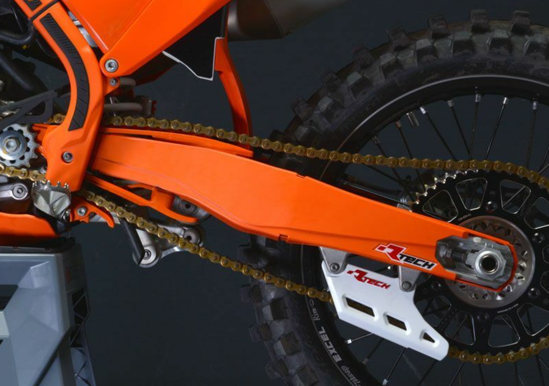 Протектор шарнир RACETECH Swingarm Protector Orange KTM 12-20