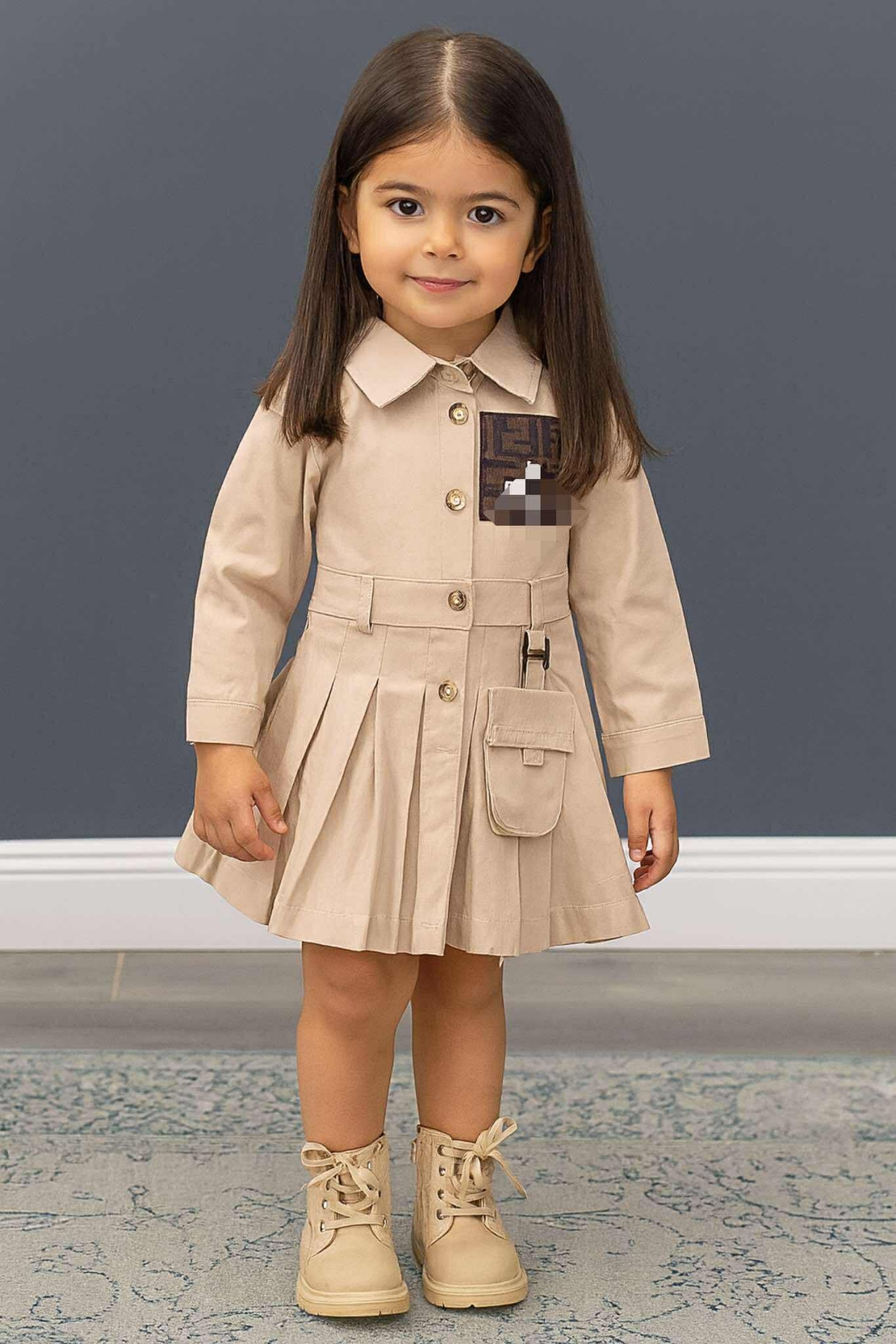 Бежова детска рокля с плисета