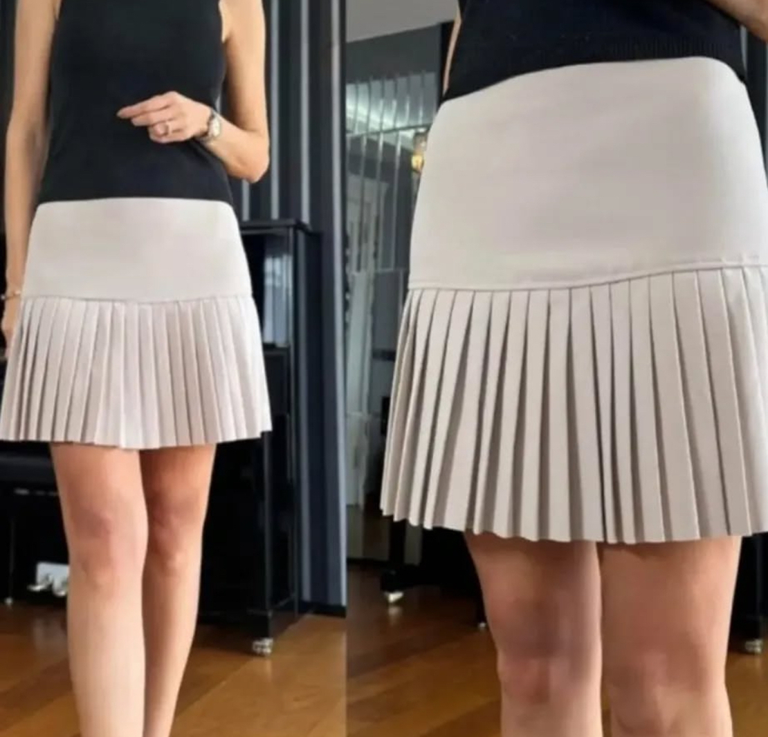 Плисирана пола в екрю с висока талия