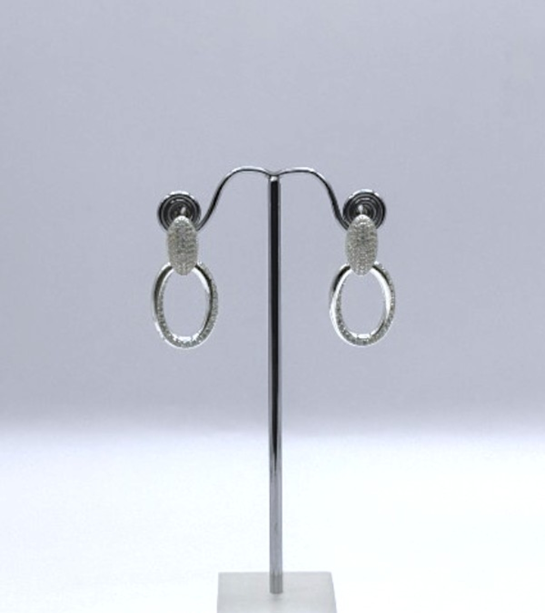 Сребърни обици с английско закопчаване овал с циркони