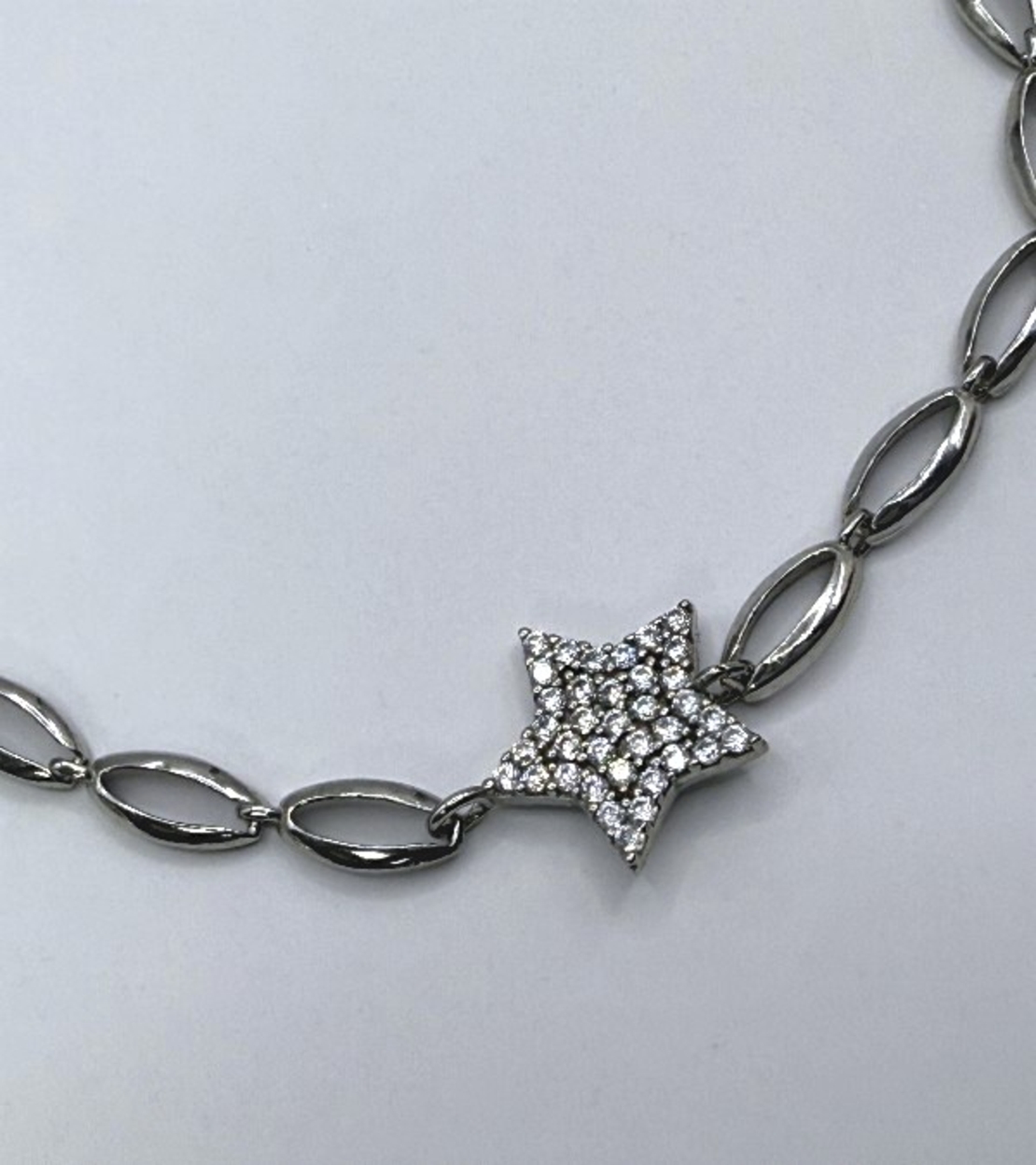 Сребърна родирана гривна със звезда