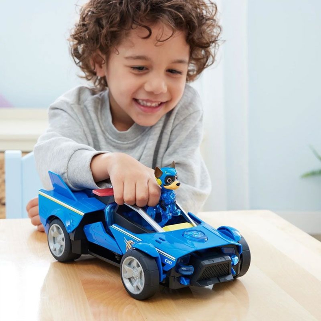 Игрален комплект Spin Master Paw Patrol: The Mighty Movie, Трансформираща се кола с фигурка Чейс, със звуци и светлини