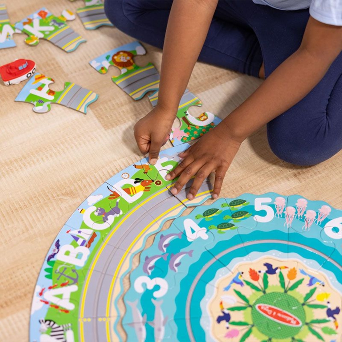 Детски пъзел за земя Melissa and Doug Round the Shore с превозни средства, 48 части