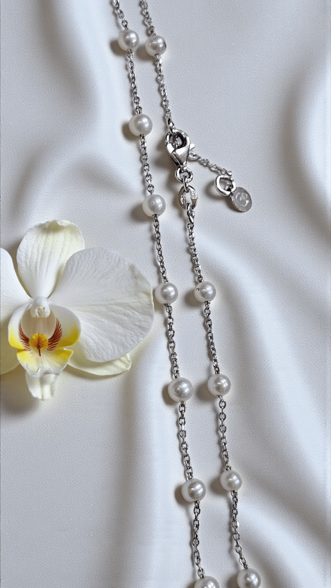 Дамска златна гривна за краче с перла