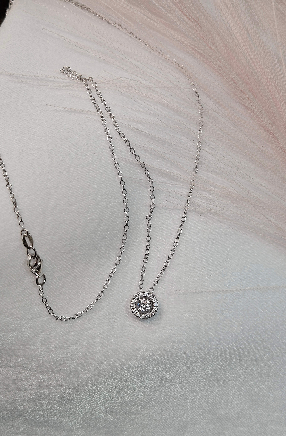 Комплект от бяло злато и циркони