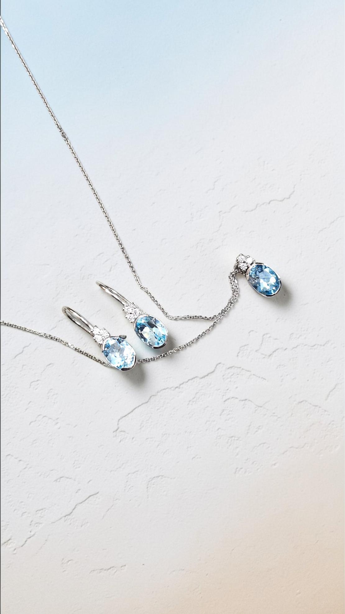Комплект от бяло златос Аквамарин и цирконии
