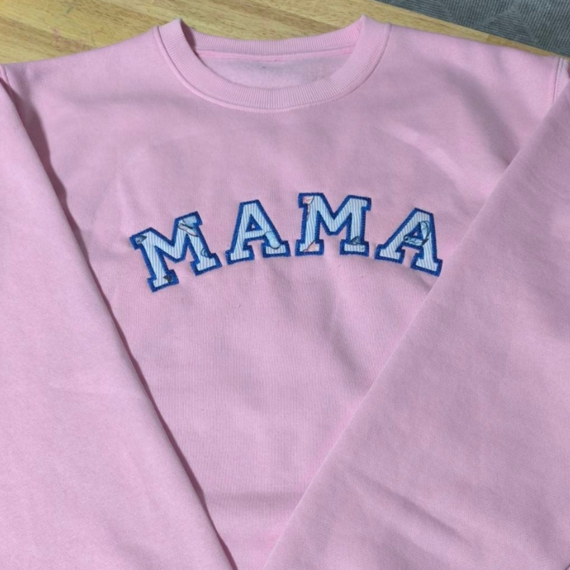 Суичър с апликация изработен от бебешки дрешки