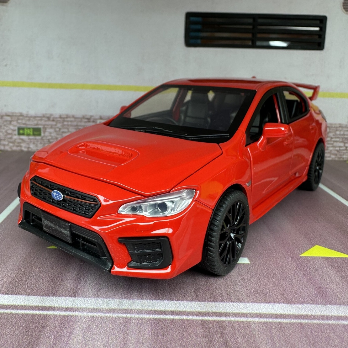 Метална кола с отварящи се врати капаци светлини и звуци Subaru Impreza 1:32