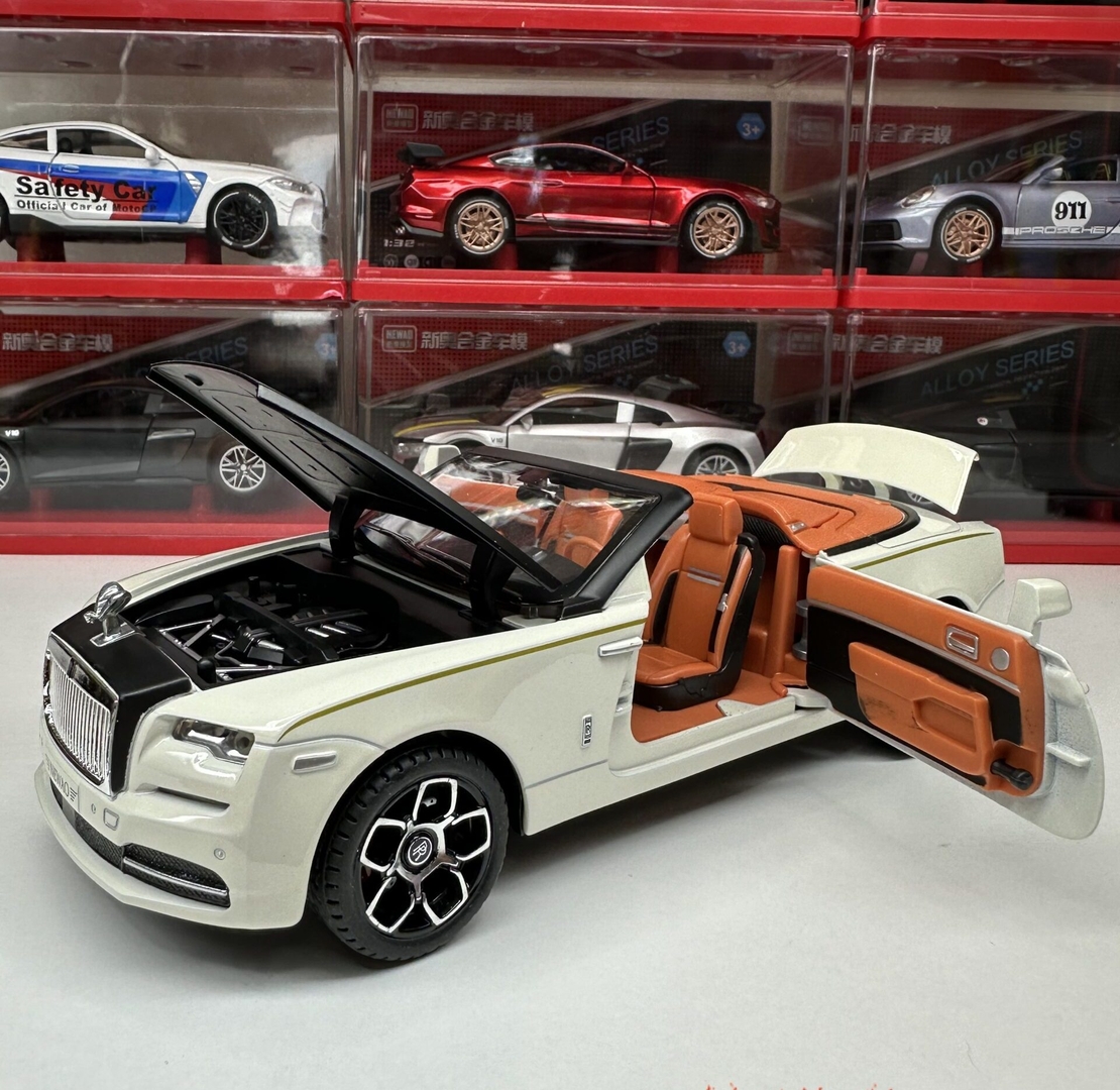 Метална кола с отварящи се врати, капаци, светлини и звуци Rolls Royce Dawn 1:24