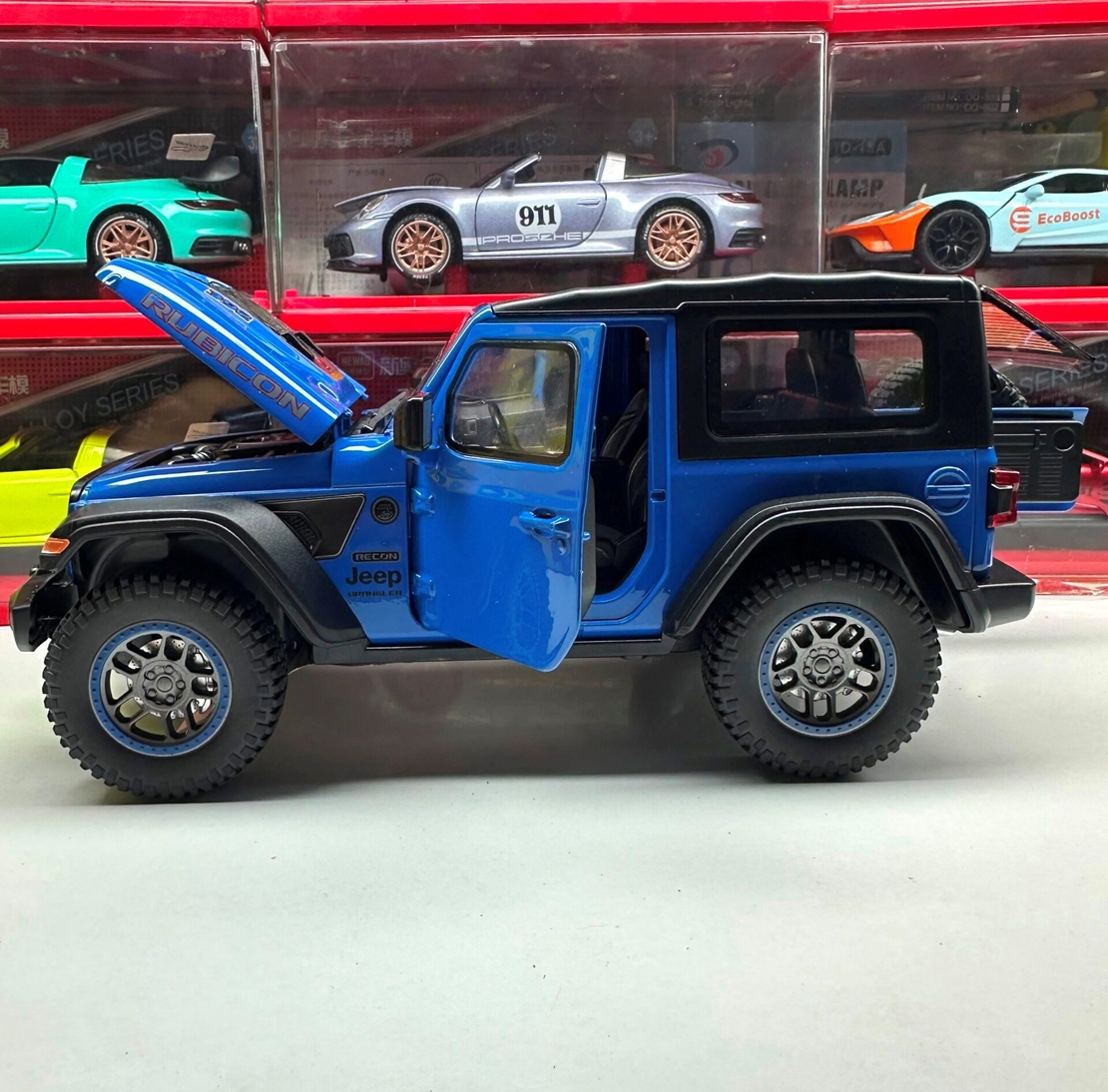 Метален джип с отварящи се врати капаци светлини и звуци Jeep Rubicon 1:18