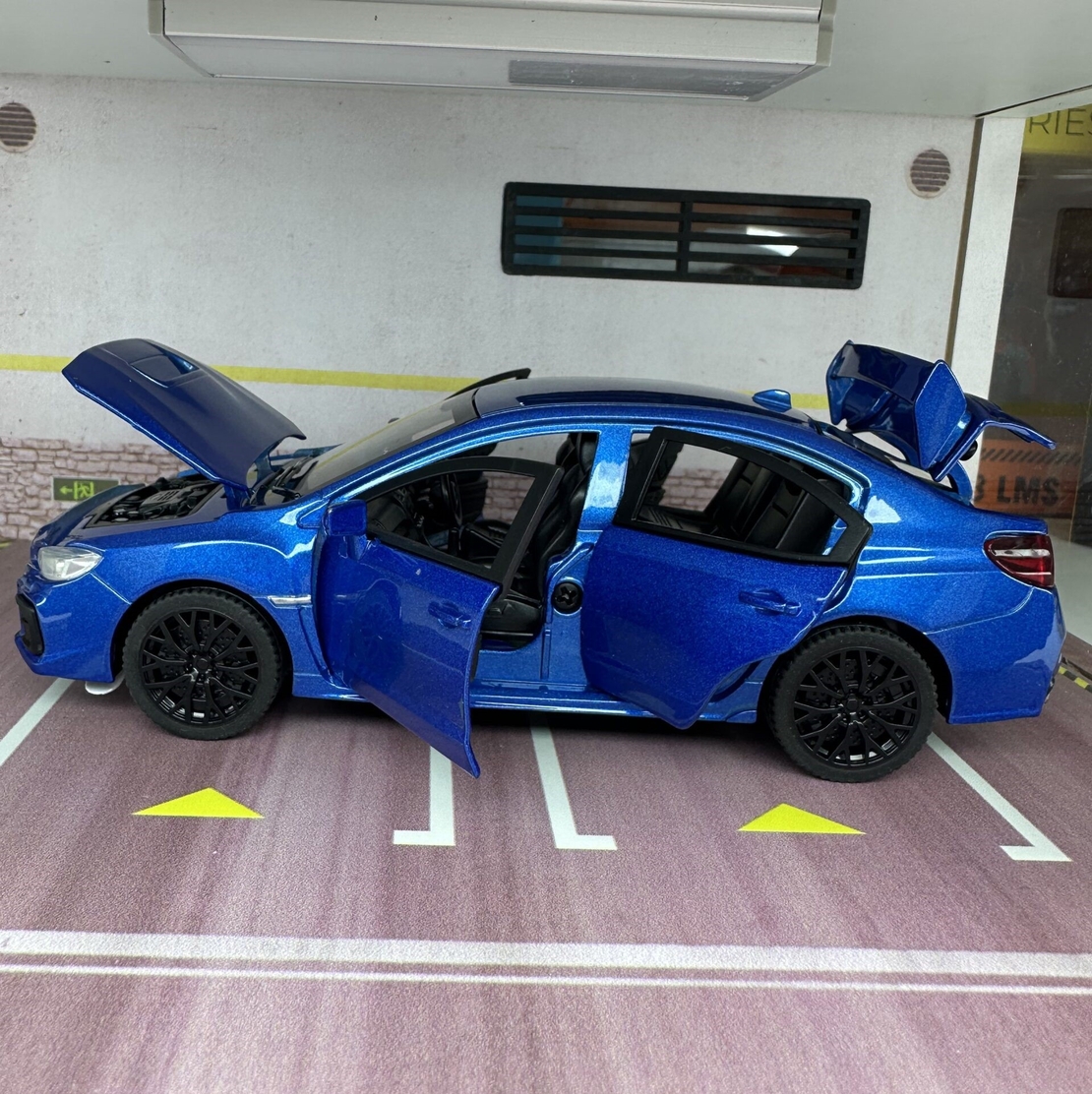 Метална кола с отварящи се врати капаци светлини и звуци Subaru Impreza 1:32