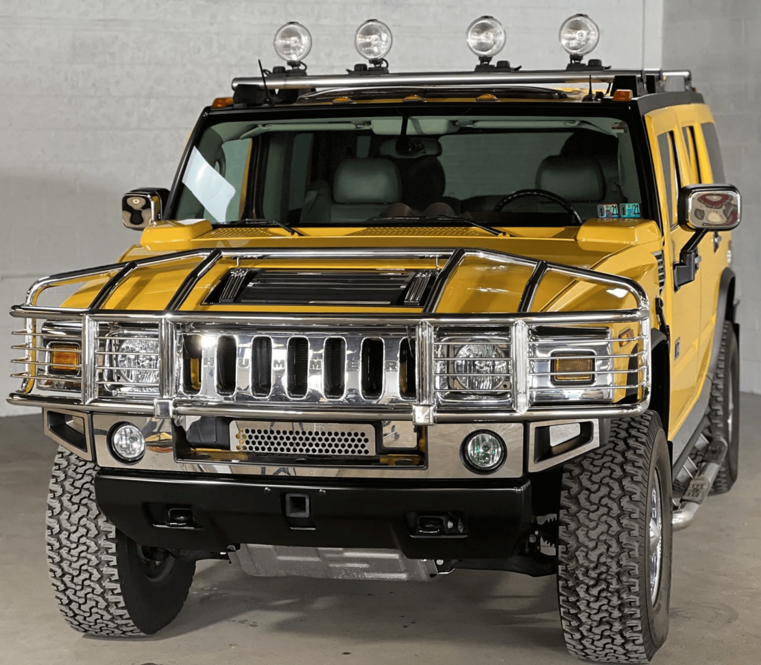 Метален джип с отварящи се врати капаци светлини и звуци Hummer H2 1:18