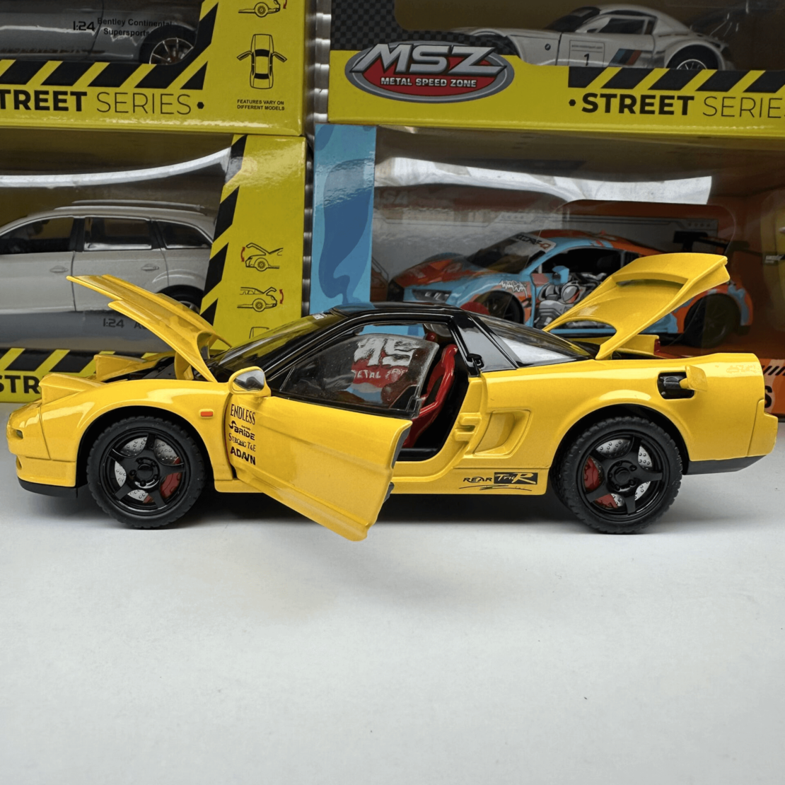 Метална кола с отварящи се врати, капаци, светлини и звуци HONDA Acura NSX 1:24