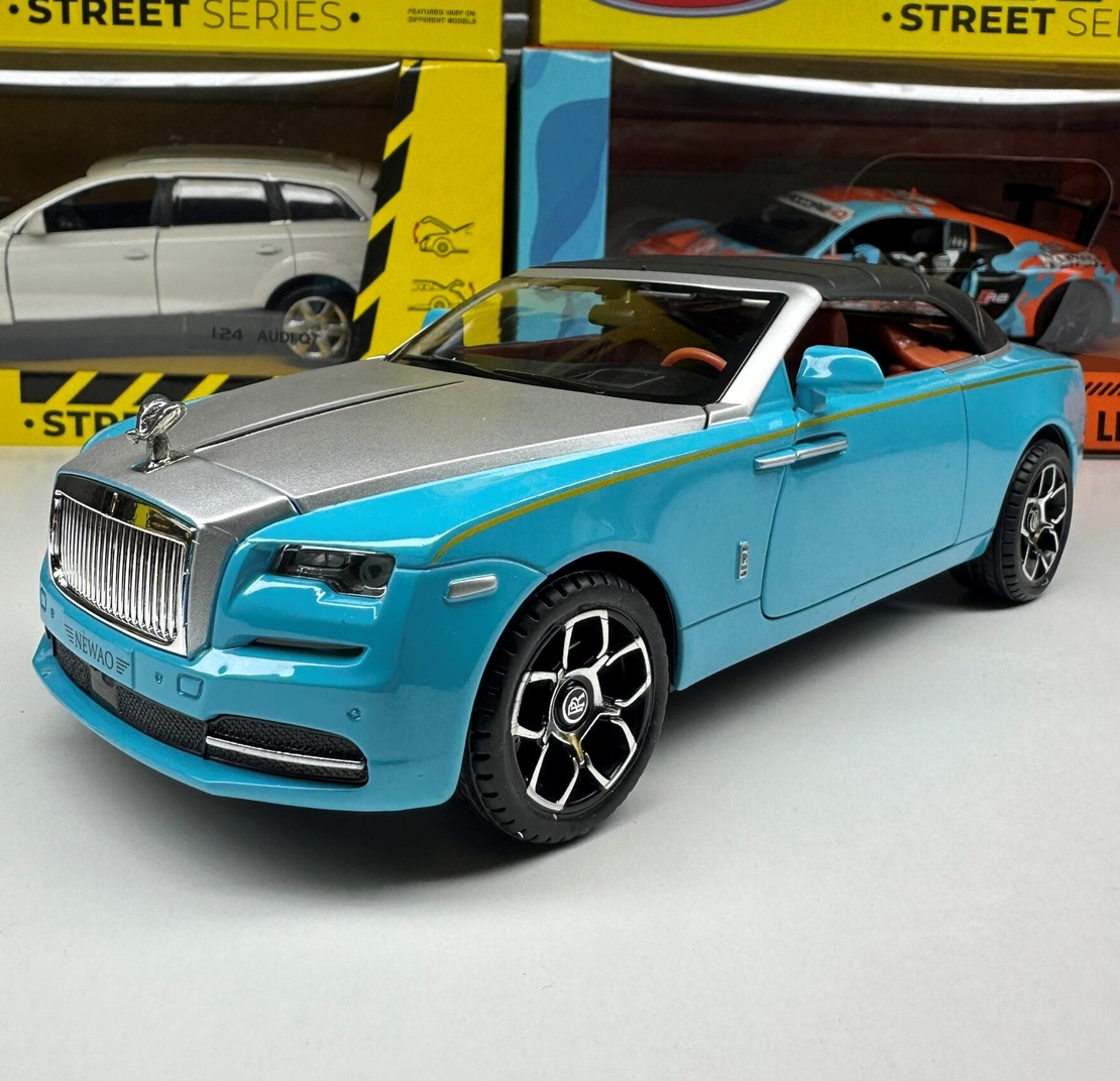 Метална кола с отварящи се врати, капаци, светлини и звуци Rolls Royce Dawn 1:24