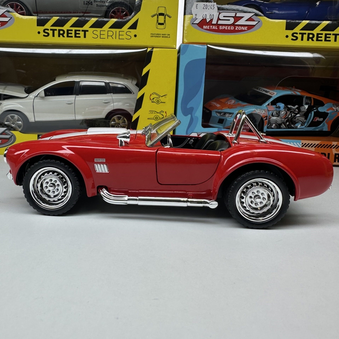 Метална кола с отварящи се врати капаци светлини и звуци Ford Shelby Cobra 427 1:24