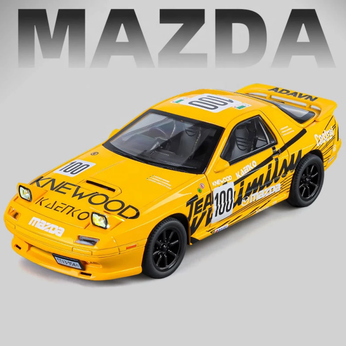 Метална кола с отварящи се врати, капаци, светлини и звуци Mazda RX7 1:24