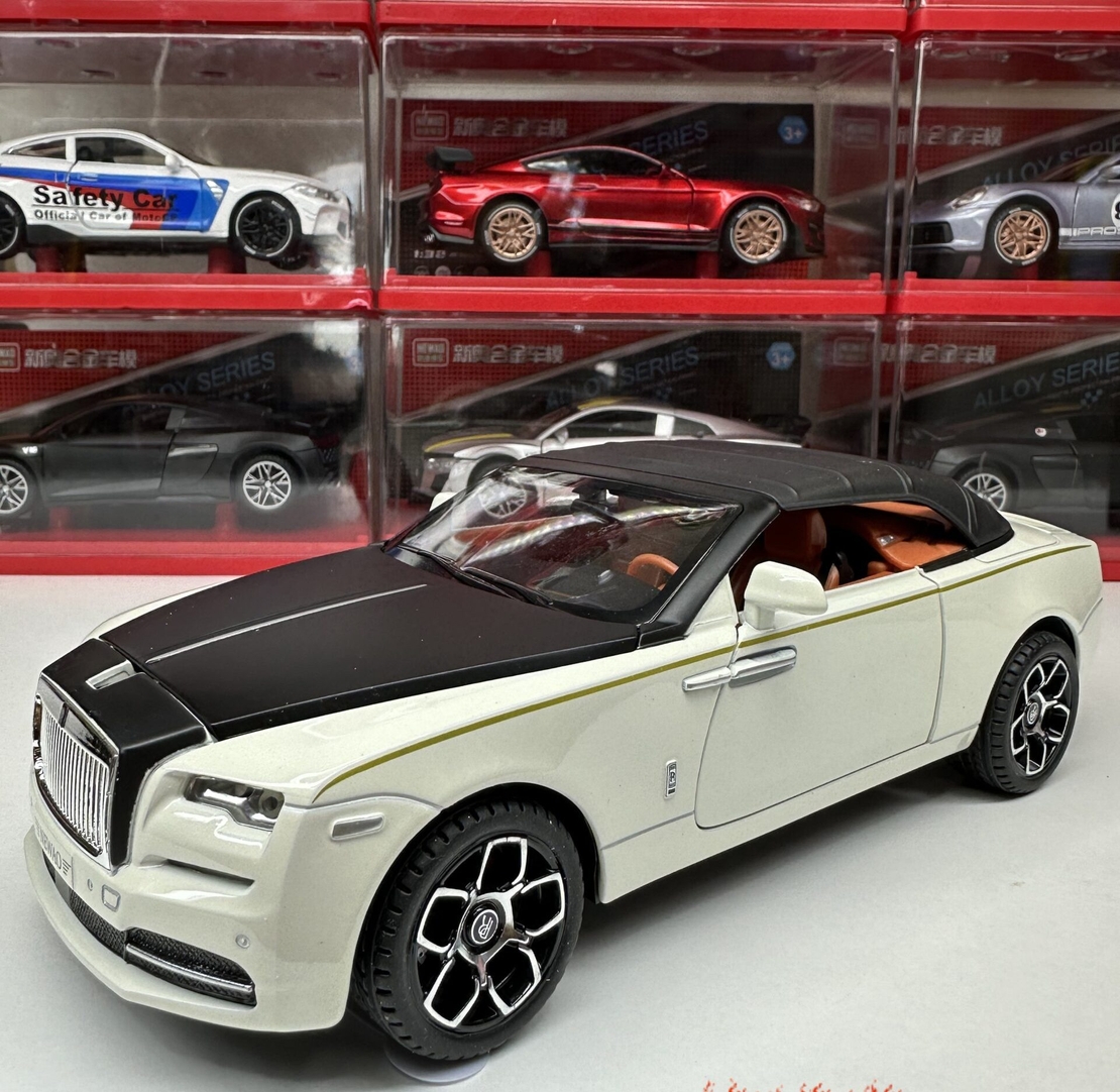 Метална кола с отварящи се врати, капаци, светлини и звуци Rolls Royce Dawn 1:24