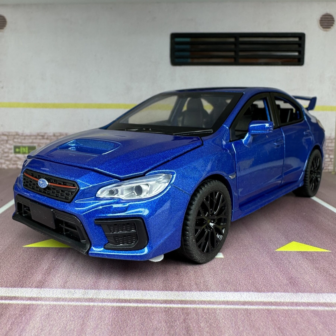 Метална кола с отварящи се врати капаци светлини и звуци Subaru Impreza 1:32