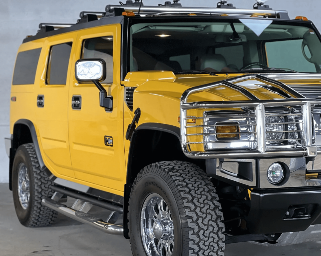 Метален джип с отварящи се врати капаци светлини и звуци Hummer H2 1:18