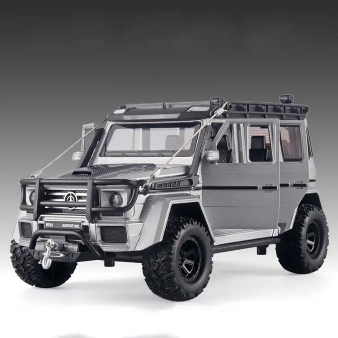 Метален джип с отварящи се врати светлини и звуци Mercedes-Benz Brabus G550 Adventure 4X4 1:24