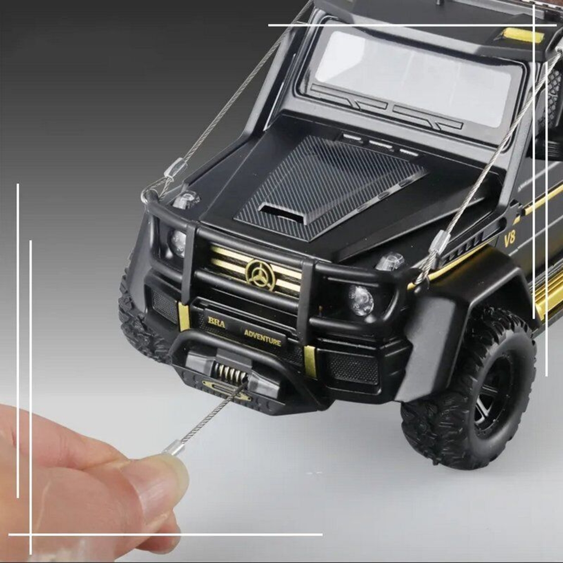 Метален джип с отварящи се врати светлини и звуци Mercedes-Benz Brabus G550 Adventure 4X4 1:24
