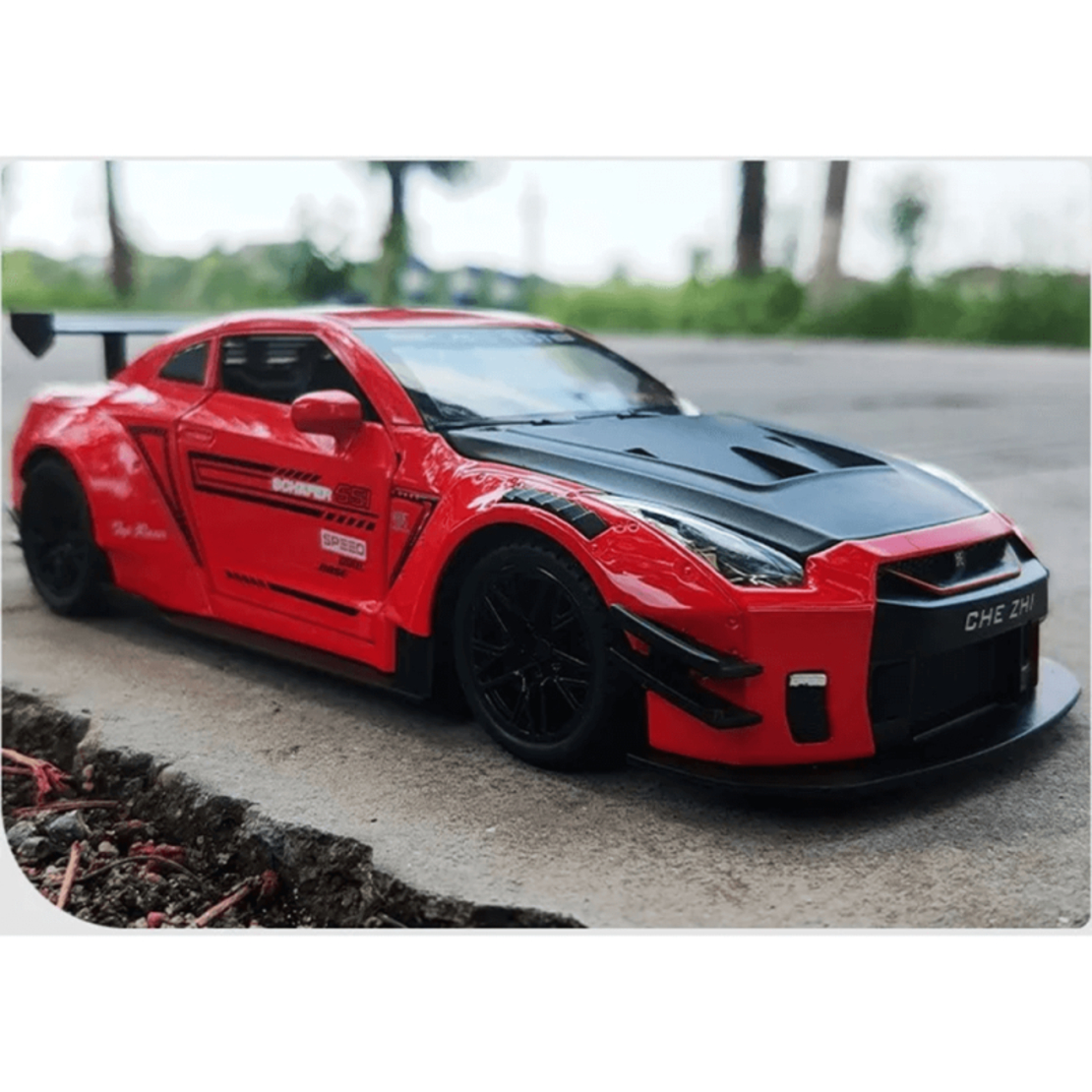 Метална кола с отварящи се врати, светлини и звуци Nissan GT-R Nismo 1:24
